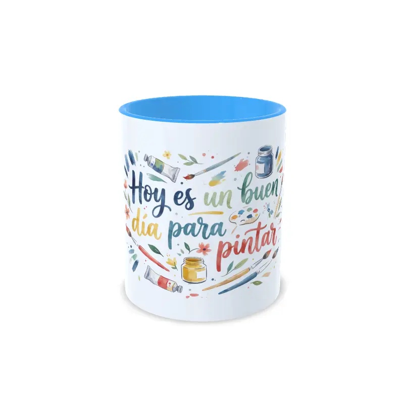 Taza de cerámica sobre pintura y arte con frase Hoy es un buen día para pintar en caligrafía e ilustraciones de acuarela, interior en color azul claro, vista frontal centrada.